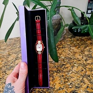 Suzanne Somers garnet and leather watch
